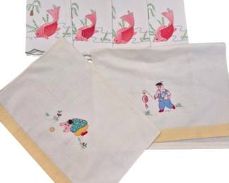 1431 - Group Embroidered Linen Tea Towels (Description): Group of embroidered linen tea towels. The  collection includes five white towels  featuring pink fish with green seaweed  motifs, and two cream-colored towels with  yellow borders depicting Asian-inspired figural scenes with applque details.
