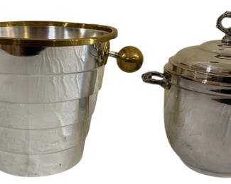 1677 - 2 Vintage Ice Buckets 8.5"x10" (Description): One features a tapered design with gold-toned  ball handles and a brass rim, while the  other is a rounded lidded ice bucket with  ornate handles. Measures 8.5 inches by 10  inches.