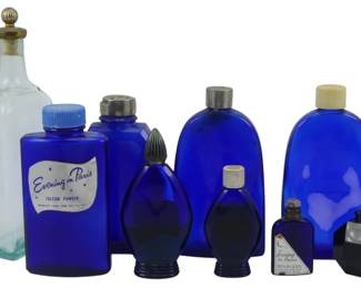 886 - Assorted Vintage Perfume Bottles, Largest: 7" (Description): A collection of assorted vintage perfume  bottles in various sizes and styles,  including cobalt blue glass Evening in Paris  bottles by Bourjois. The largest bottle  measures 7 inches tall.
