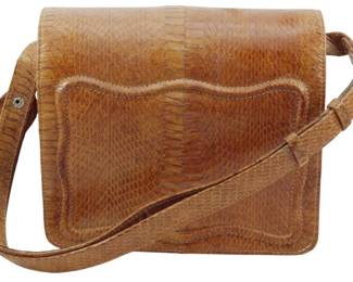 1795 - Vtg Genuine Snakeskin Shoulder Bag (Description): Vintage genuine snakeskin shoulder bag  featuring a structured rectangular design  with a front flap closure. The bag displays  the natural texture and warm tan coloring  characteristic of authentic snakeskin. Measures 8" x 8" x 4".