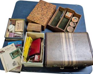 4145 - Group Lot of Vtg Collectibles & Ephemera (Description): Group lot of collectibles including a vintage  striped travel case with brass hardware,  assorted vintage postcards and travel  ephemera, photo albums, a wooden desk  organizer with green velvet lining, decorative lidded containers, a  pyrography-decorated wooden box, small wooden  boxes, and various paper goods and  memorabilia.