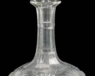 134 - American Brilliant Cut Glass Decanter 11.5" (Description): American Brilliant cut glass decanter  featuring intricate cut patterns on the body  and a faceted ball stopper. Measures 11.5" in  height.
