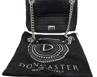 1801 - Doncaster Quilted Leather Chain Bag w/ Pouch (Description): Doncaster quilted leather chain bag with  storage bag. Made in Italy. Features  silver-tone chain strap with leather shoulder  pad and front clasp closure. Includes  original Doncaster dust bag. Measures 9 inches by 12.5 inches.
