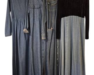 3760 - 4 Long Denim Dresses (Description): Collection of four long denim dresses in  various styles size 10-12. The group includes  a pleated front dress with three-quarter  sleeves, a button-front shirt dress style, a  snap-front western-inspired dress, and a dress featuring a black velvet bodice with  mock neck and long sleeves paired with a  flowing denim skirt. All are full-length maxi  styles in medium to dark blue denim washes.