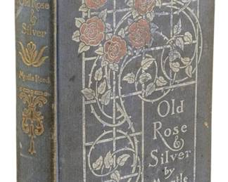 825 - 1909 1st Ed. Old Rose and Silver Myrtle Reed (Description): Old Rose and Silver by Myrtle Reed, first  edition published in 1909. This decorative  hardcover volume features an ornate cover  design with rose motifs and silver detailing  typical of the period's bookmaking craftsmanship.