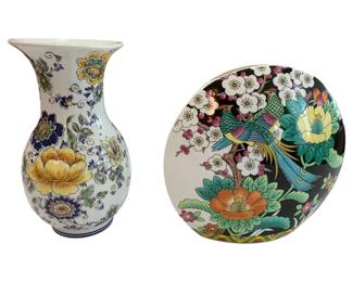 647 - 2 Floral Decorated Vases 7.5 & 8" (Description): One vase displays a traditional floral  pattern on a white ground, while the other  features colorful floral and bird motifs on a  dark ground. Measurements: 7.5 and 8 inches  tall.