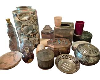 3768 - Lot of Assorted Decorative Items & Boxes (Description): A diverse lot of assorted decorative items  including a large glass jar filled with  seashells, a figural glass mermaid bottle  with stopper, various metal and wooden  trinket boxes including an octagonal box with turquoise-colored stone accents, a cloisonne  lidded container, pierced metal potpourri  holders, a marble dish, small glass perfume  bottles, a hammered metal tissue box cover,  an alabaster cup, a ruby glass tumbler, and
