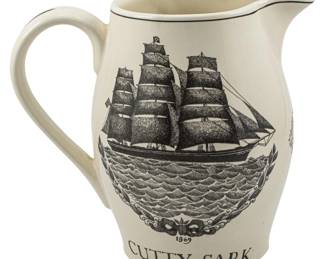 738 - Cutty Sark Scotch Whiskey Pitcher 7" (Description): Cutty Sark Scotch Whiskey pitcher featuring a  transfer-printed design of the famous  clipper ship. The pitcher measures 7 inches  in height.