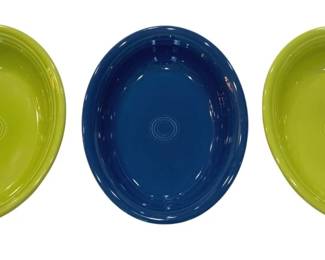 921 - 3 Fiesta Oval Serving Bowls (Description): Set of three Fiesta oval serving bowls  featuring two in lemongrass green and one in  peacock blue. Each bowl displays the classic  Fiesta concentric ring design in the center.  Measurements: 8.5" x 4.5" x 2.5".