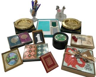 1217 - Assorted Vintage Playing Cards & More (Description): The lot includes a Tiffany & Co. boxed card  set, two sets of gold-tone brass coasters in  original boxes, various decorative playing  card sets, glass swizzle sticks in a crystal  holder, a frosted glass cat figurine, a small framed landscape painting, & etc.