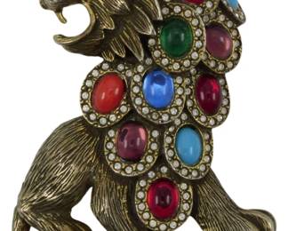 1941 - Vintage Roaring Lion Brooch (Description): Vintage roaring lion brooch featuring a bold,  dramatic design. The lion is depicted in a  seated, roaring pose with detailed  craftsmanship throughout.