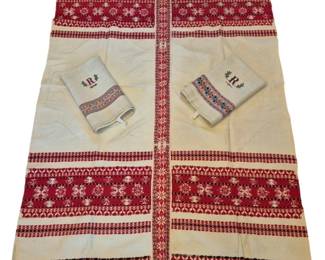 1459 - Vtg Embroidered Tablecloth w/ Napkins 75x67" (Description): Vintage cream-colored tablecloth with  matching napkins featuring traditional red  and cream woven embroidered bands in folk  patterns. The accompanying napkins are  monogrammed with the letter 'R' and feature coordinating embroidered borders. Measures75"  x 49".