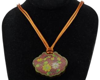 1893 - Chinese Cloisonne Pendant Necklace (Description): Chinese cloisonne pendant necklace featuring  a decorative enamel pendant suspended on a  cord. The cloisonne work displays traditional  floral motifs characteristic of Chinese  enamelwork.