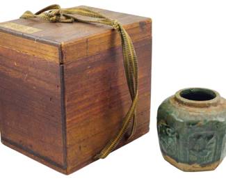 184 - Vintage Japanese Pottery Vase w/ Tomobako (Description): Vintage Japanese pottery vase accompanied by  its assumed original tomobako (wooden storage  box). The hexagonal celadon-glazed vessel  features molded decorative panels. The  traditional wooden box is fitted with a fabric cord closure and bears calligra