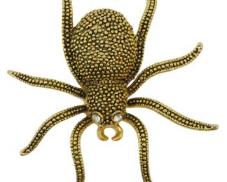 1907 - Gold Tone Tarantula Brooch (Description): Gold tone tarantula brooch featuring a  textured body and legs with crystal accent  eyes.
