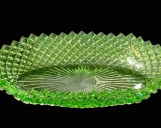 2772 - English Hobnail Green Uranium Oval Bowl 8"x4" (Description): Green uranium glass oval bowl featuring a  diamond-cut pattern on the sides and a  starburst design in the center. Measures 8  inches by 4 inches.
