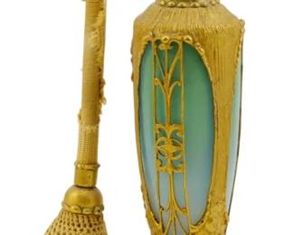 167 - Devillbis Art Deco Perfume Atomizer 7.5" (Description): Devillbis Art Deco perfume atomizer featuring  gilt metal overlay on green glass body with  original mesh-covered bulb atomizer. Measures  7.5 inches in height.
