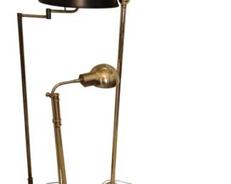3709 - Three Brass Floor Lamps w/ Swing Arm Designs (Description): Collection of three brass floor lamps  featuring swing arm designs. The group  includes two swing arm lamps with shades, one  with a black shade and one with a pleated  cream shade, as well as a smaller pharmacy-style adjustable lamp. The lamps  feature polished brass finishes with circular  weighted bases. The smallest lamp is sold  as-is. Tallest lamp measures 57 inches in  height.