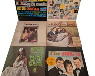3910 - Beach Boys Mamas & Papas Vinyl Record Lot (Description): A collection of vintage vinyl records  featuring Beach Boys and Mamas and the Papas  albums along with related artists. The lot  includes The Beach Boys 'All Summer Long' on  Capitol Records, two Mamas and the Papas albums including 'If You Can Believe Your  Eyes and Ears,' Bill Justis 'Alley Cat to  Green Onions' instrumental hits compilation  on Smash Records, Herb Alpert's Tijuana Brass  'Whipped Cream & Other Delights' on A&M