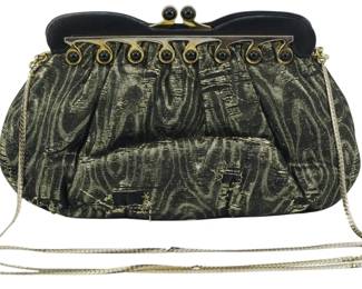 1860 - Vtg Judith Leiber Evening Purse (Description): Vintage Judith Leiber evening purse featuring  an elegant design with gold-tone hardware  and chain strap. Measures 5 inches by 3  inches by 2.5 inches.