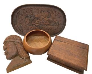 966 - Carved Wood Lot Dragon Tray Bowl Box & Bust (Description): A collection of carved wooden decorative  items including an oval tray with detailed  dragon motif, a turned wooden bowl, a lidded  rectangular box, and a carved bust depicting  a figure in profile. The pieces showcase various carving techniques and wood tones.