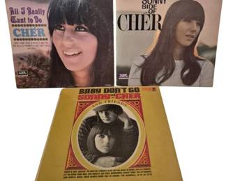 3912 - 3 Sonny & Cher Vintage Vinyl Records (Description): Collection of three vintage Cher and Sonny  vinyl records. The lot includes "All I Really  Want to Do" by Cher on Imperial Records,  "The Sonny Side of Cher" on Imperial Records,  and "Baby Don't Go" by Sonny and Cher and Friends on Reprise Records. All three albums  feature classic 1960s cover photography and  artwork typical of the era.