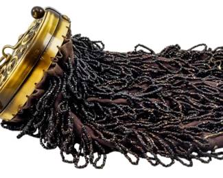 152 - Vintage Bakelite & Beaded Purse 8"x3" (Description): Vintage Bakelite beaded purse featuring a  decorative frame with chain handle and  elaborate beaded fringe body. Measures 8" x  3".