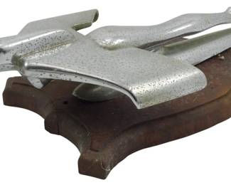 1884 - Vtg Nash Airflight Flying Lady Hood Ornament (Description): Vintage Nash Airflight Flying Lady hood  ornament. This classic automotive collectible  features the iconic flying lady design  associated with Nash automobiles. Mounted on  a wooden display base. Measures 5 inches by 13 inches by 8 inches.