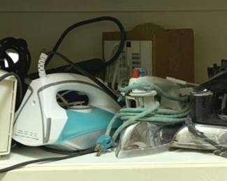 1081 - Shelf Lot of Assorted Irons & Vacuums (Description): Used as is electric/electronic/mechanical  item. No guarantee all components, untested.
