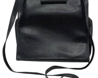 1843 - Vtg Donna Karan Lizardskin Purse (Description): Vintage Donna Karan lizardskin purse  featuring a structured silhouette with a  shoulder strap. Measures 10 inches by 10  inches by 3.5 inches.