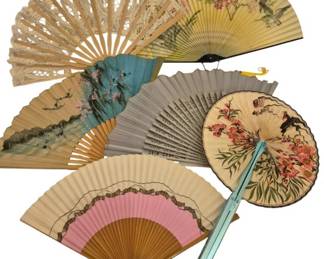 2743 - Group of Vintage Decorative Hand Fans (Description): A collection of vintage hand fans in various  styles and designs. The group includes  folding fans with painted floral and bird  motifs on paper and fabric, a carved wooden  lace-style fan, and a circular paddle fan with floral decoration. The fans feature  bamboo and wood sticks in natural and painted  finishes, with decorative elements in colors  including pink, blue, yellow, and cream.