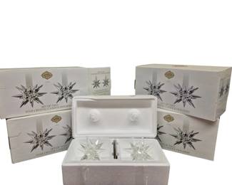 4029 - 4 Sets of 2 Star Crystal Candle Holders (Description): Four sets of star crystal candle holders,  with two holders per set. Each set comes in  its original box with protective styrofoam  packaging. The candle holders feature a  starburst design with radiating crystal points creating an elegant star shape. All  sets appear complete and in excellent  condition with original packaging.