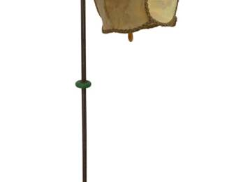 1343 - Antique Bridge Lamp w/ Jadeite Accents (Description): Antique bridge floor lamp featuring a silk  shade with decorative metal filigree trim.  The lamp has an ornate cast metal base with  scrollwork details and green jadeite glass  accents on the column. The curved gooseneck arm displays Victorian-style scrolled  embellishments. Measures 61" Tall. Used as is electric/electronic/mechanical  item. No guarantee all components, untested.