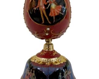 246 - Clara and the Nutcracker Porcelain Musical Egg (Description): by Ardleigh Elliot - musical selection "Dance  of the Sugarplum Fairy" - 7" tall Used as is electric/electronic/mechanical  item. No guarantee all components, untested.
