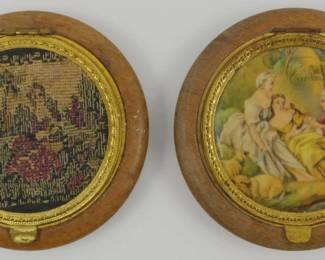 1746 - 2 Vintage Rococo Wooden Compacts 3" (Description): Two vintage Rococo-style wooden compacts. One  features a petit point or tapestry insert  depicting a landscape with florals, while the  other displays a romantic figural scene.  Both have gilt metal bezels surrounding the decorative centers. Each measures 3 inches in  diameter.
