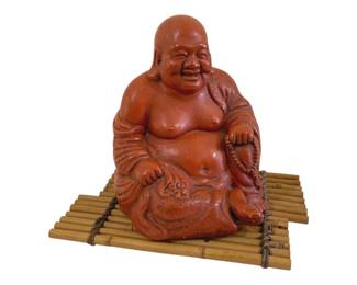 418 - Chinese Buddha Heshang Figure 12"x10" (Description): Figure depicting the traditional laughing  Buddha in a seated position resting on bamboo  tray. Measures 12 inches by 10 inches.