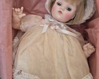1393 - Madame Alexander Mary Mine Blonde Doll 16" (Description): Mary Mine doll measuring 10 inches. The doll  is presented in its original packaging with  pink tissue paper.