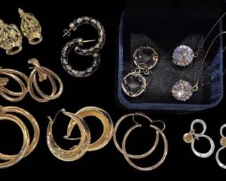 2809 - Group of Assorted Costume Earrings (Description): A collection of assorted costume earrings  featuring various styles including gold-tone  hoop earrings in multiple sizes and designs,  textured leopard head earrings, speckled  enamel hoops, large crystal drop earrings, rhinestone studs, white enamel circle link  earrings, and delicate wire hoops. The lot  includes approximately ten pairs in  gold-tone, silver-tone, and mixed metal  finishes.