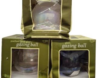 4024 - 3 Pearlized Finish Glass Gazing Balls in Box (Description): Three decorative glass gazing balls with  pearlized finish, designed to enhance garden  spaces. The balls feature an iridescent  quality and remain in their original retail  packaging. Each 10-inch diameter glass ball is sold with bases separately.