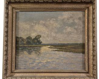 3779 - Oil on Canvas Landscape Painting 16"x17.5" (Description): Oil on canvas landscape painting depicting a  tranquil waterway scene with trees along the  shoreline and a cloudy sky. The work features  soft, impressionistic brushwork capturing  reflections on the water's surface. Presented in an ornate gilt wood frame with decorative  carved details.