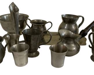 1683 - Lot of Assorted Pewter Items (Description): A lot of assorted pewter pieces including  pitchers, cups, mugs, and vessels in various  sizes and styles.