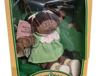 4159 - Cabbage Patch Kids Katherine Francisco Doll (Description): Cabbage Patch Kids doll named Katherine  Francisco. The doll comes in its original  packaging with birth certificate and adoption  papers included.