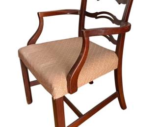 1417 - Mahogany Ribbon Back Arm Chair 36"x21.5"x24" (Description): A wood chair featuring a ladder back design  with curved horizontal slats and shaped arms.  The seat is upholstered in a patterned  fabric.