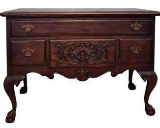 2047 - Lane Chippendale Style Chest 32"x45"x20" (Description): Lane chest in Chippendale style featuring  carved shell motif on the front panel, brass  bail handles, cabriole legs with ball and  claw feet, and a scalloped apron.