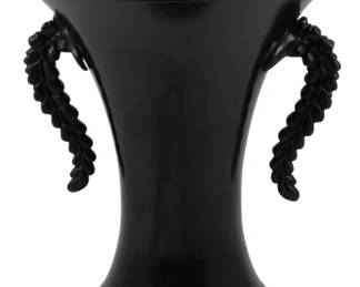 1960 - Bronze Ikebana Flower Vase 9.5" (Description): Japanese bronze ikebana flower vase featuring  a classic trumpet-shaped form with a wide  flared rim and tapered body resting on a  circular foot. The vase is adorned with  decorative handles designed as cascading wisteria or grape clusters, adding elegant  sculptural interest to the piece. The surface  displays a rich black patina throughout.  Measures 9.5 inches in height.