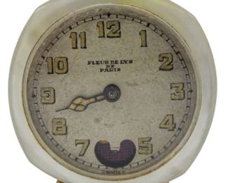 120 - Lenox Fleur De Lys of Paris Mini Clock MOP (Description): Lenox Watch Co. Fleur De Lys of Paris  miniature clock featuring mother of pearl  inlay. Measures 2.5 inches. Used as is electric/electronic/mechanical  item. No guarantee all components, untested.
