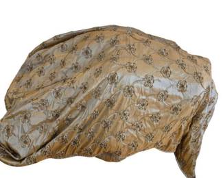 1307 - Satin King Size Comforter (Description): A luxurious gold satin coverlet featuring an  elegant repeating pattern of embroidered  floral rosettes connected by delicate swag  designs. The sophisticated tonal embroidery  creates a refined, dimensional texture across the entire piece. Measures 102 inches by 92  inches.