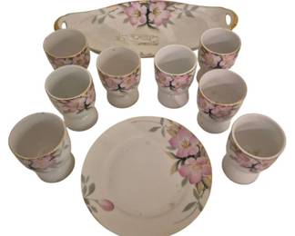3926 - 10 Pcs Noritake Azalea Pattern Porcelain (Description): Ten pieces of Noritake Azalea pattern  porcelain. The set features the classic  Azalea design with hand-painted pink blossoms  and green foliage on a white ground,  accented with gold trim. The grouping includes a handled serving tray, a bread and  butter plate, and eight cups or tumblers in  varying sizes. Each piece displays the  distinctive floral motif characteristic of  this popular Noritake pattern.