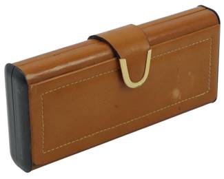 1877 - Mid Century Fiocchi Italy Grooming Set (Description): Mid Century grooming set by Fiocchi, Italy.  The set is housed in a tan leather case with  contrast stitching and a brass hook closure.  Measures 2.5 inches by 6 inches by 1 inch.