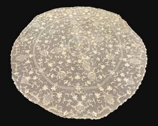 352 - Lace Tablecloth Oval 89"x83" (Description): Oval lace tablecloth measuring 89 inches by  83 inches.